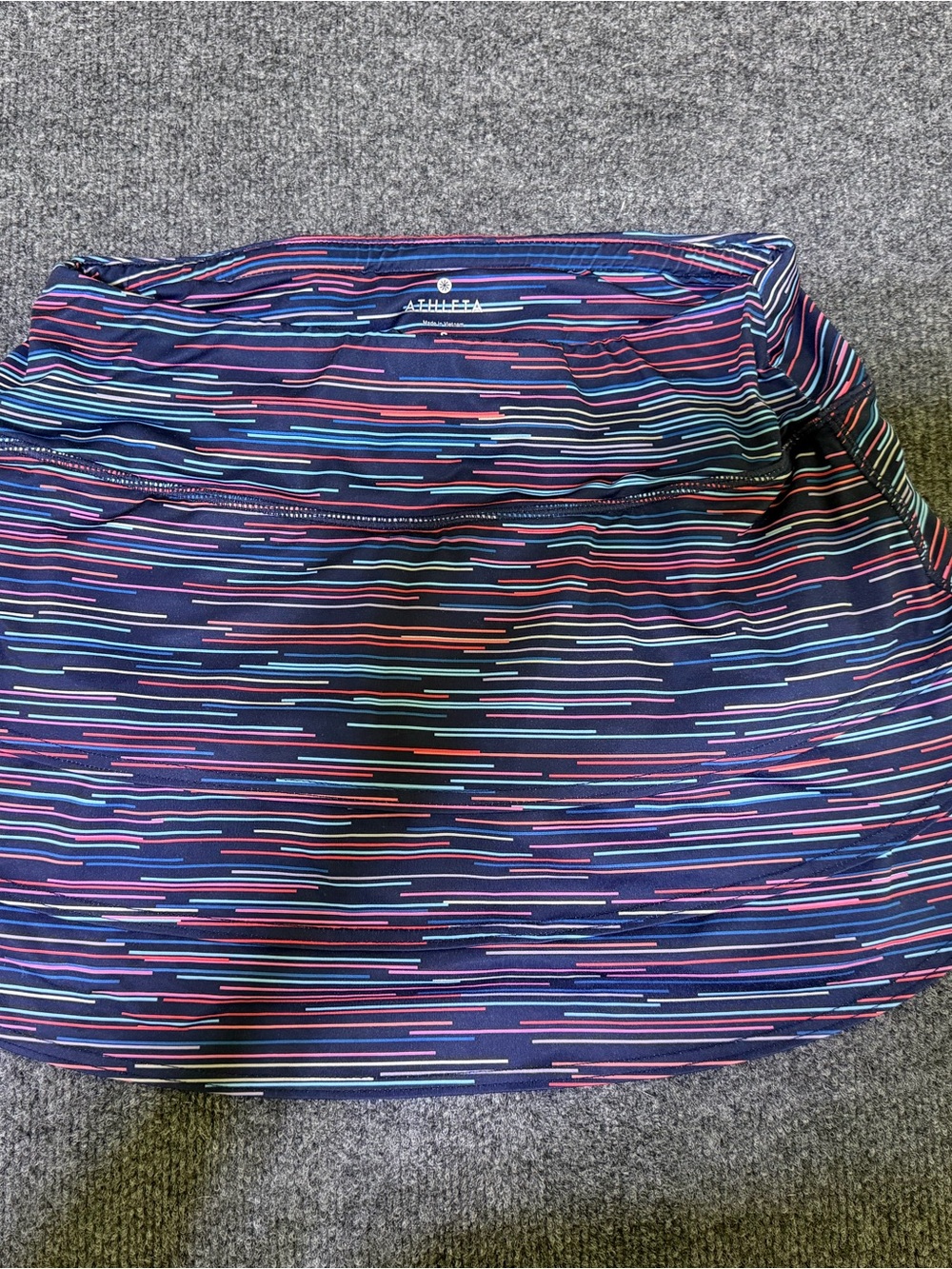 Athleta Navy Skort with Multicolor Stripe Detail